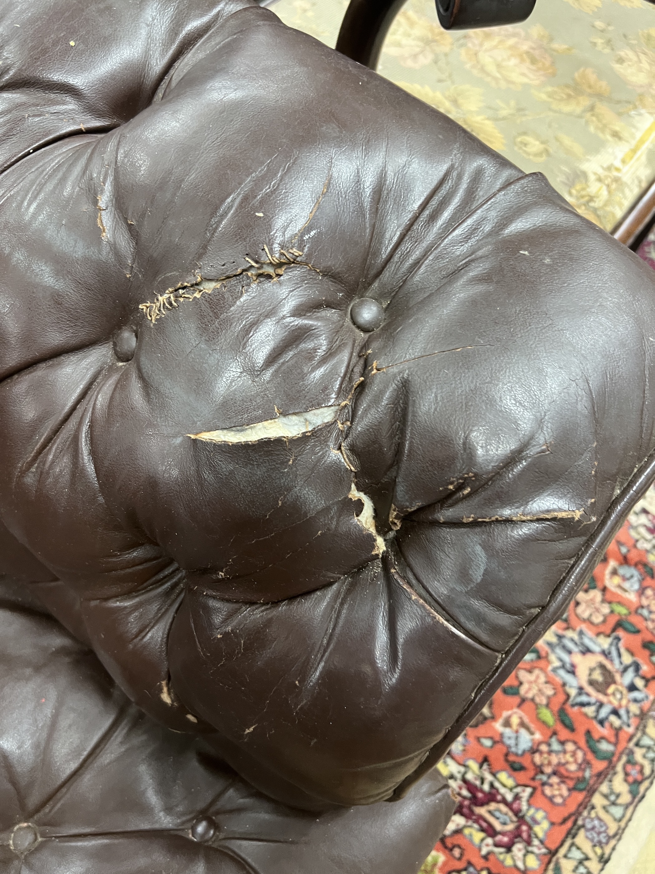 A Victorian buttoned brown leather Chesterfield settee, length 200cm, width 84cm, height 68cm